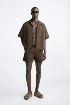 Online CAMISA TÉCNICA BOXY FIT Hombre Camisas