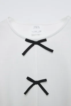 Niños ZARA 6 - 14 Años·Camisetas<CAMISETA APLIQUE LAZOS