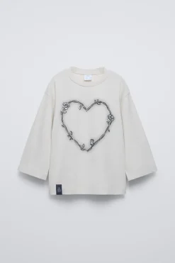 Niños ZARA 6 - 14 Años·Camisetas<CAMISETA CORAZÓN Y FLORES