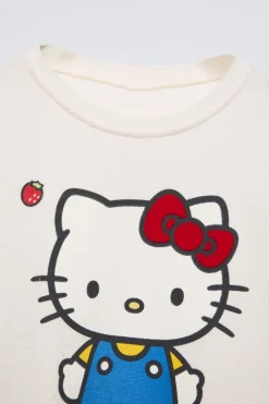 Niños ZARA 1½ - 6 Años·Camisetas|1½ - 6 Años·Licencias<CAMISETA FLOCK HELLO KITTY ©