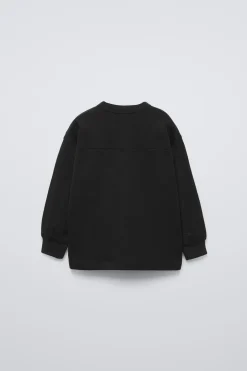 Niños ZARA 1½ - 6 Años·Camisetas|6 - 18 Meses·Camisetas<CAMISETA TEXTO FLOCK