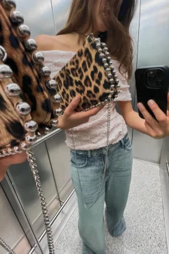 Outlet CARTERA BANDOLERA TACHAS Mujer Bolsos