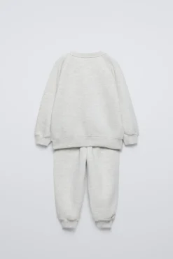 Niños ZARA 1½ - 6 Años·Sudaderas|1½ - 6 Años·Pantalones<CONJUNTO JOGGING SUDADERA Y PANTALÓN TEXTO FLOCK