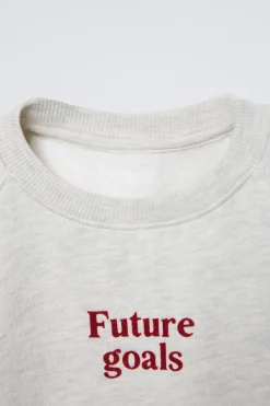 Niños ZARA 1½ - 6 Años·Sudaderas|1½ - 6 Años·Pantalones<CONJUNTO JOGGING SUDADERA Y PANTALÓN TEXTO FLOCK