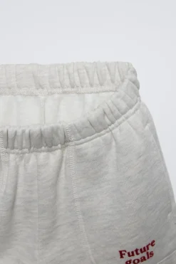 Niños ZARA 1½ - 6 Años·Sudaderas|1½ - 6 Años·Pantalones<CONJUNTO JOGGING SUDADERA Y PANTALÓN TEXTO FLOCK