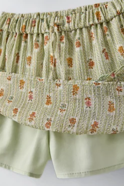 Niños ZARA 6 - 14 Años·Faldas / Bermudas<FALDA BERMUDA FLORES BRILLO