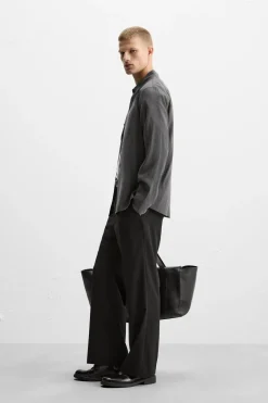 New PANTALÓN FLARED FIT Hombre Pantalones