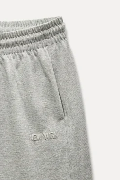 New PANTALÓN HILO METALIZADO TEXTO Mujer Pantalones