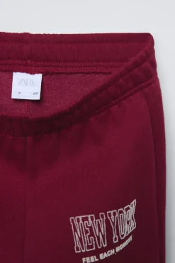 Niños ZARA 6 - 14 Años·Pantalones|6 - 14 Años·Deporte / Jogging<PANTALÓN JOGGER TEXTO FLOCK