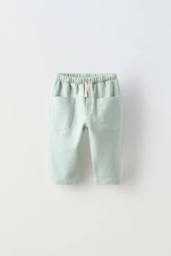Niños ZARA 6 - 18 Meses·Pantalones / Leggings<PANTALÓN LISO BOLSILLOS