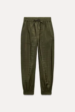 Sale PANTALÓN SATINADO BAJO PUÑO Mujer Pantalones