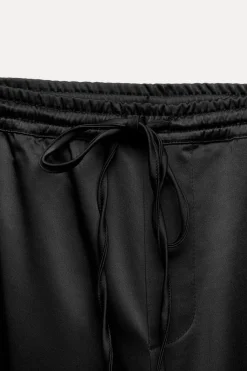 Outlet PANTALÓN SATINADO BANDA LATERAL Mujer Pantalones