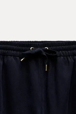 Online PANTALÓN WIDE LEG TEXTURA Mujer Pantalones