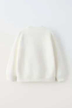 Niños ZARA 6 - 14 Años·Sudaderas<SUDADERA LAZO ESTAMPADO