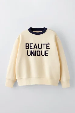 Niños ZARA 6 - 14 Años·Sudaderas<SUDADERA TEXTO FLOCK