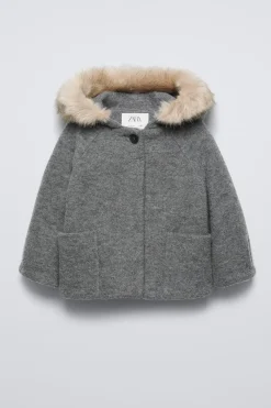 Niños ZARA 6 - 18 Meses·Abrigos / Buzos<TRENKA LANA CAPUCHA